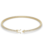 2 Carat Yellow Gold Round Shape Diamond Bracelet With Prong Setting.